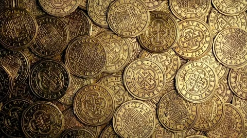Cent coins on rotating showcase in macro shot Piles of different gold coins. Stock Footage 272768643