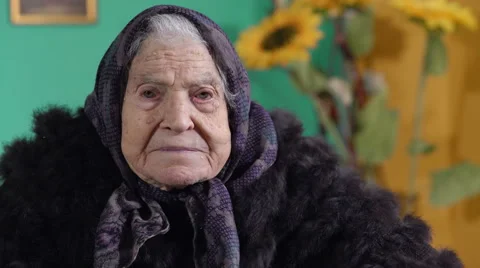 Centenary woman staring intensely, home, curious Stock Footage 59107463