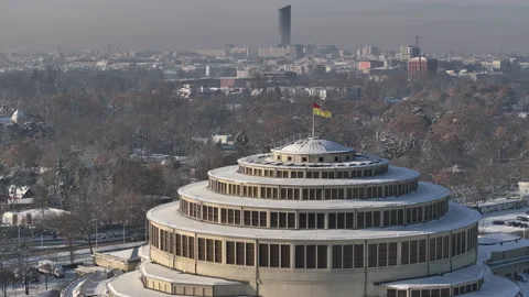 Centennial Hall dome in snowy Wrocław on a hazy winter day Stock Footage 346646407