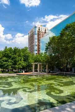 Centennial Olympic Park reflecting pool and Atlanta skyline Stock Photos