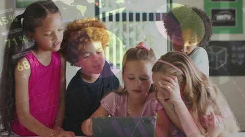 Center child tapping tablet and initiating interactive charts over screen while Stock Footage 333552857