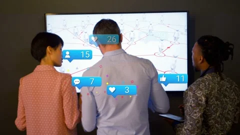 Center man tapping phone before network map, alert bubbles growing and moving Stock Footage 332937033