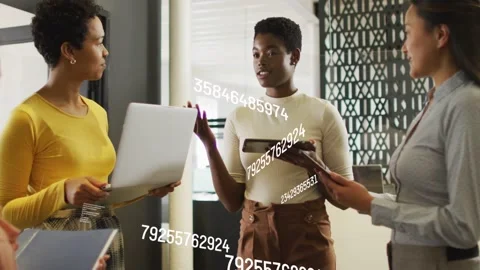 Center speaker tapping tablet and leading business data discussion, data Stock Footage 334703182