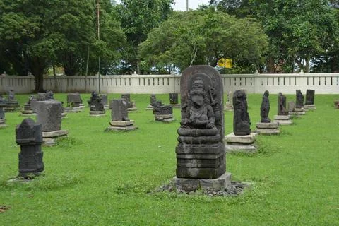 Centered deity statue in outdoor yard Prambanan Temple Museum Yogyakarta In.. Stock Photos