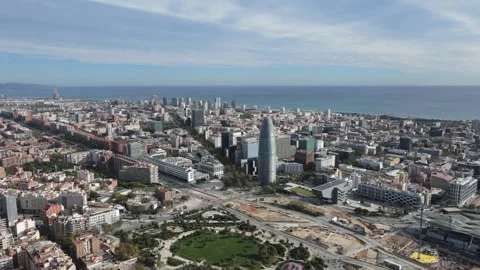 Centered drone approach to reflective coastal tower Stock Footage 331847404