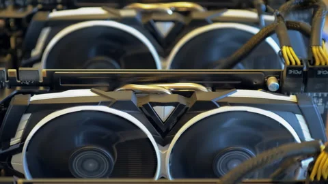 Centered graphics card with dual cooling fans in open GPU mining rig Stock-Footage 346945583