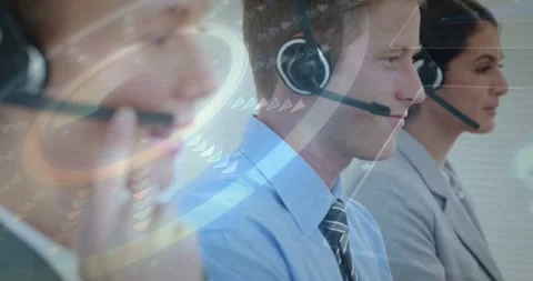 Centered male agent and team answering incoming support call, adjusting mic with Stock Footage 333968146