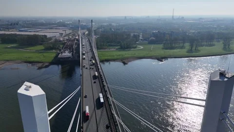 Centered view between twin pylons above traffic Stock Footage 335364429