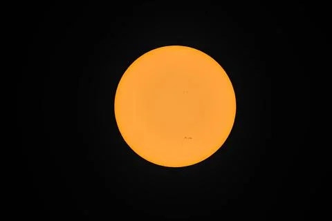 Centered view of the Sun with two active sunspot regions seen in Killarney Stock Photos