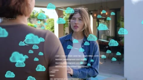 Centered woman holding tablet by pool, chat causing cloud icons, code showing Stock Footage 333221297