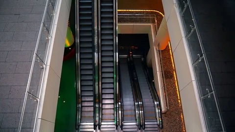 Center's escalators are working. Top view of architecture, urban transportation. Stock Footage 113453989