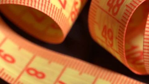 Centimeter rotates on the table Stock Footage 70723519