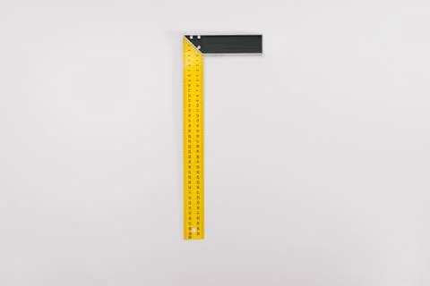 Centimeter tape corner on a white background isolation. Copy space on top. Co Stock Photos