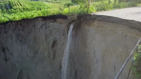 Central Aceh in Indonesia faces widening ground collapse, INDONESIA, ID - 02 Mar Stock Footage 329968443
