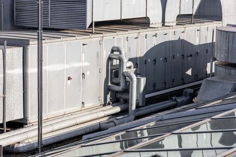 Central air conditioning system on the roof of the building, large shafts for Stock Photos