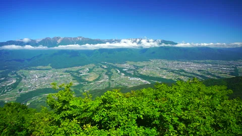 The Central Alps Mountains, including Kiso Komagatake and Mt. Utsugi, and the Video stock 330849886