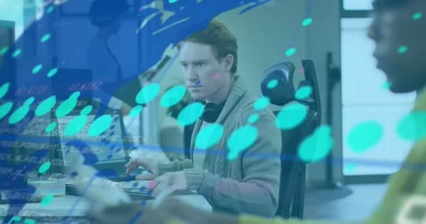 Central analyst typing, live data causing map and readouts sweeping across desk, Stock Footage 333829829