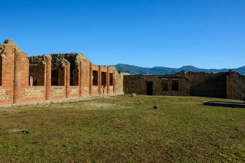 Central Baths ruins under clear sky, Pompeii Stock Photos