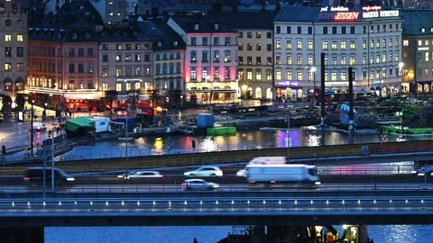 The central bridge with Gustav Adolf's square behind in the evening Stock Footage 154911791