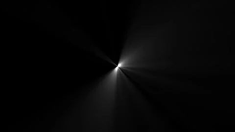 Central bright lens flare with rotating light rays against a dark backgroun.. Video stock 337805444
