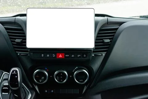 Central car dashboard with blank tablet screen and controls Stock Photos