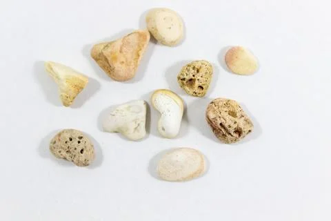 Central close-up shot of multiple colorful stones that has collected from bea Stock Photos