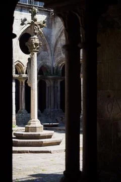 Central column seen from the passageways of the Se Cathedral in Porto Stock Photos