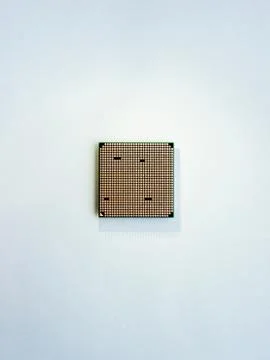Central computer processor. CPU on light blue background. Technological detai Stock Photos