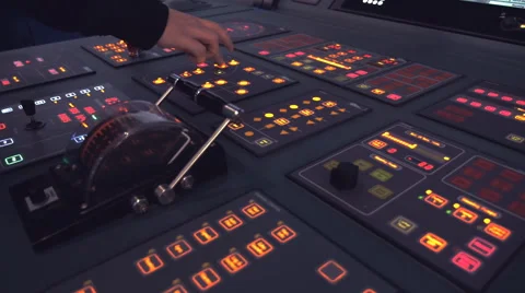 Central control panel with illuminated buttons and lever arm Stock Footage 68353715