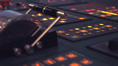 Central control panel with illuminated buttons and lever arm. Closeup Stock Footage 68353742