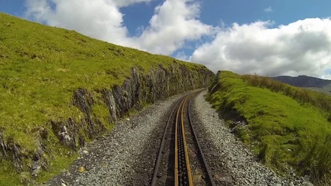 Central front view of mountain train, POV track centre frame beautiful landscape Vídeos de archivo 90103863