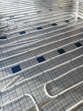Central heating pipe for underfloor heating Stock Photos