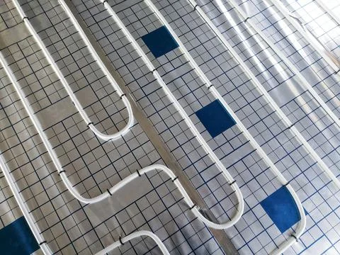 Central heating pipe for underfloor heating Stock Photos