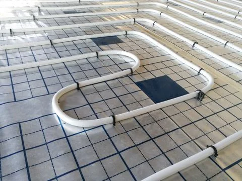 Central heating pipe for underfloor heating Stock Photos