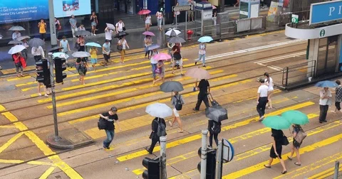 Central, Hong Kong, 05 July 2017 -: People walking in the street at central Stock Footage