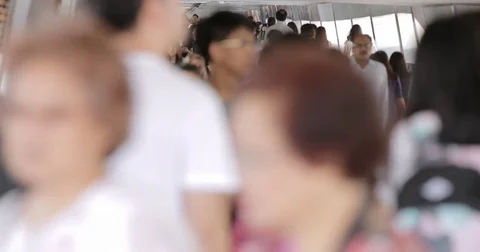 Central, Hong kong, 19 July 2017 -: People walking in the over pass Stock Footage