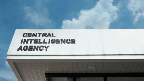 Central Intelligence Agency word sign displayed on building with blue sky Vídeos de archivo 318563383