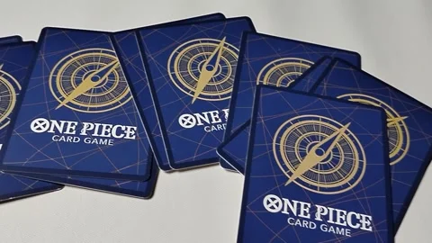 Central Java 22 April 2026: Close-up of One Piece Card Game card back design, sh Video stock 333503620