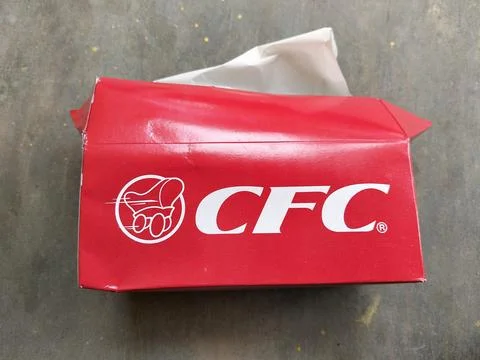 Central Java 24 August Indonesia 2026: A red cardboard takeaway box of CFC  Stock-Fotos