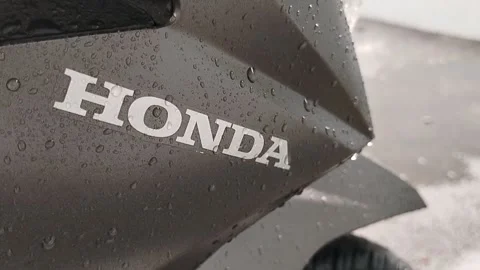 Central Java April 9 2026: Rainy day scene showing Honda Beat motorcycle parts,  動画素材 332625819