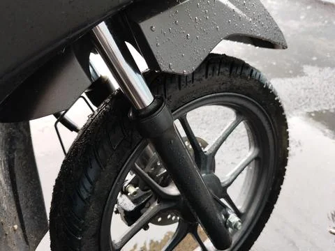 Central Java April 9 2026: Rainy day scene showing Honda Beat motorcycle parts,  Photos