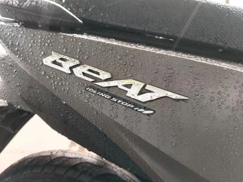 Central Java April 9 2026: Rainy day scene showing Honda Beat motorcycle parts,  Photos