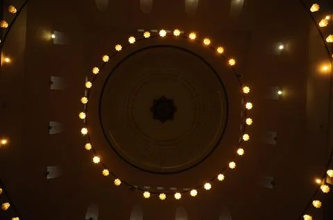 Central Java Grand Mosque: Lights inside the mosque in a dark space. Stock Photos