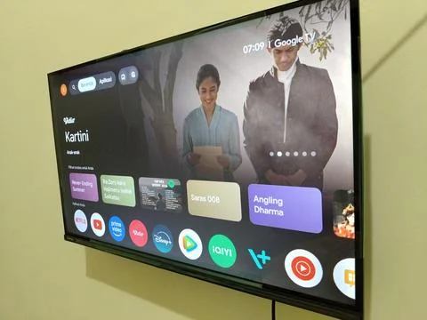 Central Java Indonesia 1 July 2026: Minimalist wall-mounted television showing  Stock Photos