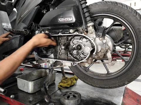 Central Java Indonesia 1 July 2026: Mechanic performing routine maintenance  Stock-Fotos