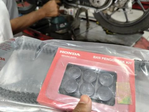 Central Java Indonesia 1 July 2026: Automatic scooter repair process showing CVT Stock Photos