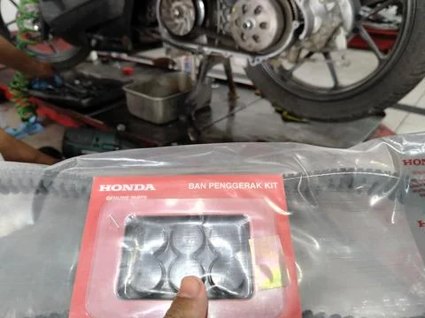 Central Java Indonesia 1 July 2026: Automatic scooter repair process showing CVT Stock Photos