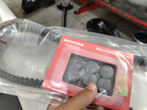 Central Java Indonesia 1 July 2026: Automatic scooter repair process showing CVT Stock Photos