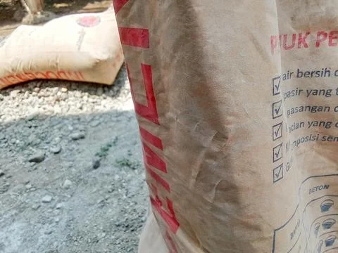 Central Java Indonesia 1 November 2023: Tiga Roda cement in a packaging. Photos