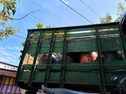 Central Java Indonesia 10 June 2026: truck carrying multiple drums filled Stock Photos